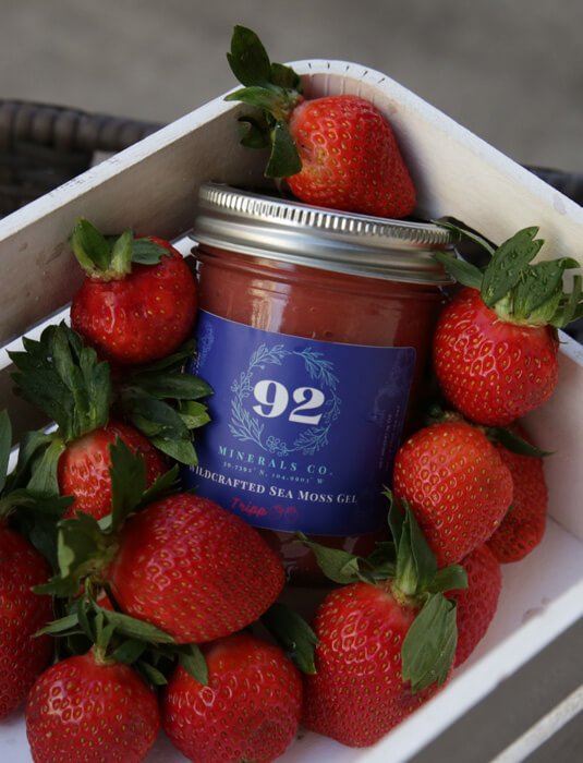 sea moss sitting in basket of strawberries